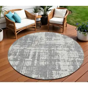 Photo of 8' Gray And Ivory Round Abstract Washable Indoor Outdoor Area Rug