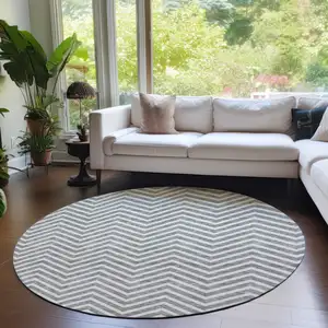 Photo of 8' Gray And Ivory Round Chevron Washable Indoor Outdoor Area Rug