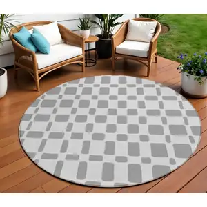 Photo of 8' Gray And Ivory Round Geometric Washable Indoor Outdoor Area Rug