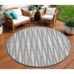 Photo of 8' Gray And Ivory Round Geometric Washable Indoor Outdoor Area Rug
