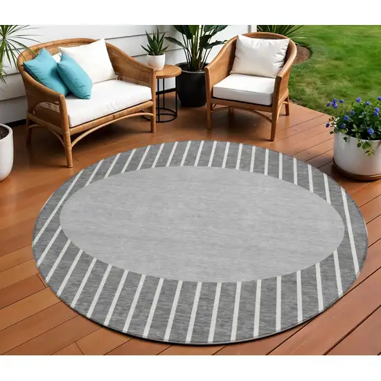 8' Gray And Ivory Round Striped Washable Indoor Outdoor Area Rug Photo 1