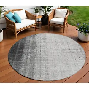 Photo of 8' Gray And Ivory Round Striped Washable Indoor Outdoor Area Rug