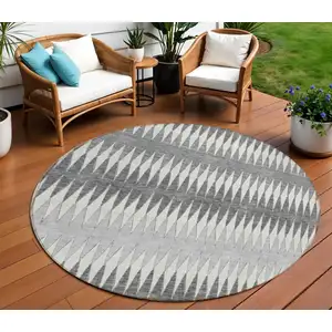 Photo of 8' Gray And Ivory Round Striped Washable Indoor Outdoor Area Rug