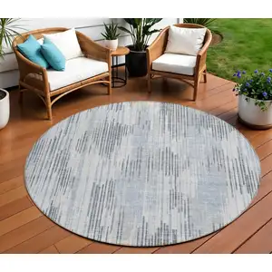 Photo of 8' Gray And Ivory Round Striped Washable Indoor Outdoor Area Rug
