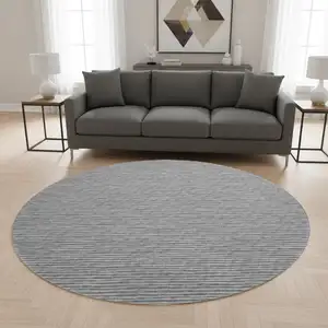 Photo of 8' Gray And Ivory Striped Washable Round Rug With UV Protection