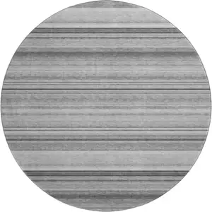 Photo of 8' Gray And Ivory Striped Washable Round Rug With UV Protection