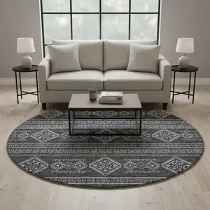 Photo of 8' Gray And Ivory Tribal Washable Round Rug With UV Protection