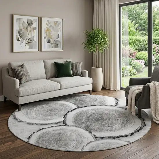 8' Gray And Ivory Faux Bois Washable Round Rug With UV Protection Photo 1
