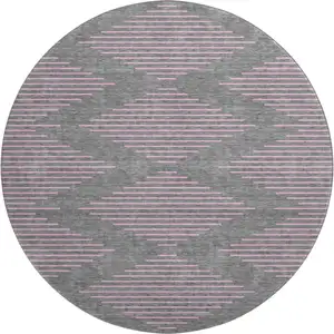 Photo of 8' Gray And Pink Geometric Washable Round Rug With UV Protection