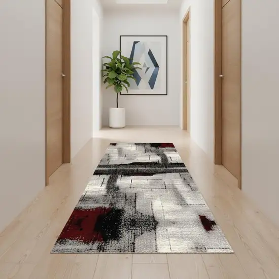 16' Gray And Red Abstract Runner Rug Photo 1