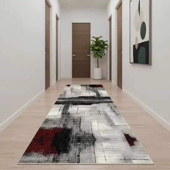 11' Gray And Red Abstract Runner Rug Photo 1