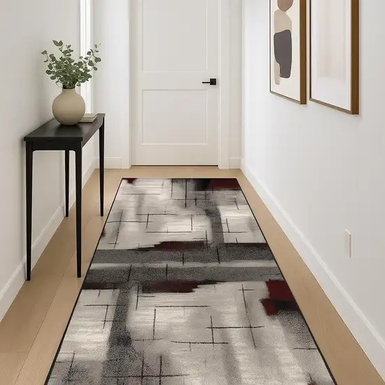 12' Gray And Red Abstract Runner Rug Photo 1