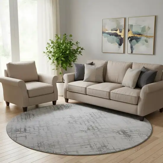 8' Gray And Silver Abstract Geometric Washable Round Rug With UV Protection Photo 1
