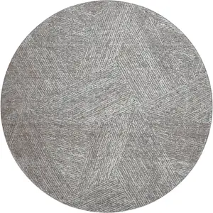 Photo of 8' Gray And Silver Abstract Washable Round Rug With UV Protection