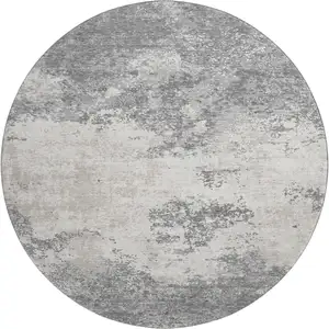 Photo of 8' Gray And Silver Abstract Washable Round Rug With UV Protection