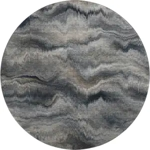 Photo of 8' Gray And Silver Abstract Washable Round Rug With UV Protection