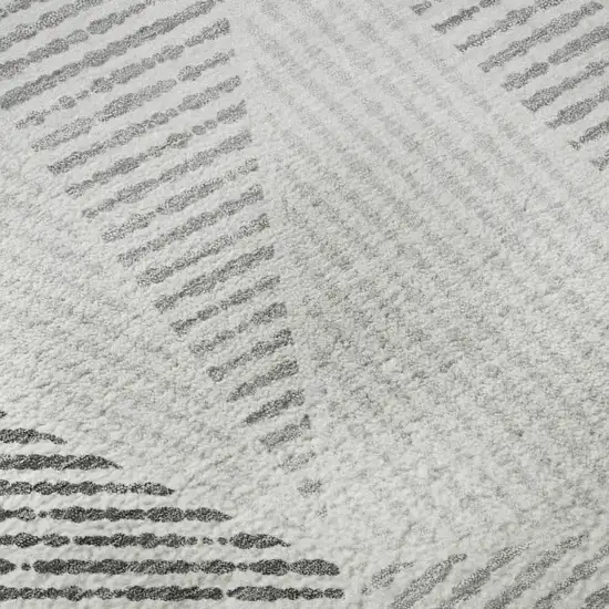 8' Gray And Silver Geometric Washable Round Rug With UV Protection Photo 9