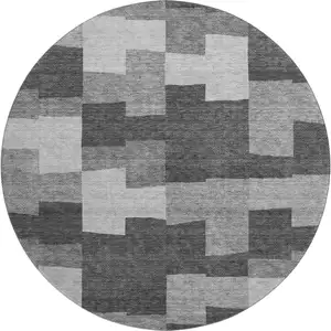 Photo of 8' Gray And Silver Geometric Washable Round Rug With UV Protection