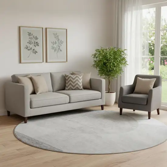 8' Gray And Silver Geometric Washable Round Rug With UV Protection Photo 1