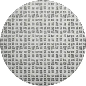 Photo of 8' Gray And Silver Geometric Washable Round Rug With UV Protection