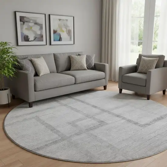 8' Gray And Silver Geometric Washable Round Rug With UV Protection Photo 1