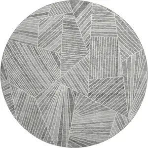 Photo of 8' Gray And Silver Geometric Washable Round Rug With UV Protection