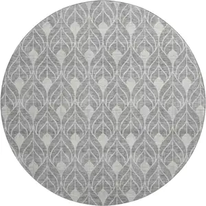 Photo of 8' Gray And Silver Geometric Washable Round Rug With UV Protection