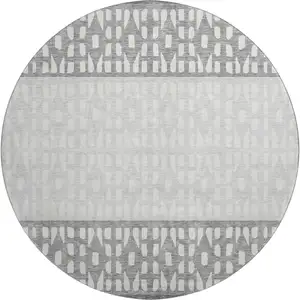 Photo of 8' Gray And Silver Geometric Washable Round Rug With UV Protection