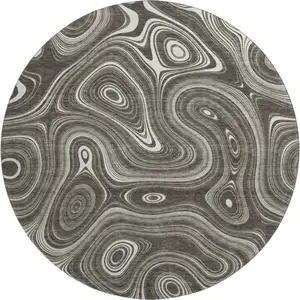 Photo of 8' Gray And Silver Geometric Washable Round Rug With UV Protection