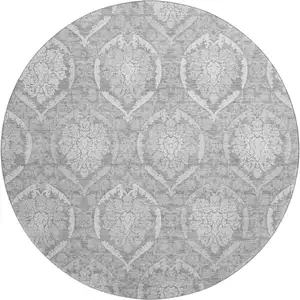 Photo of 8' Gray And Silver Medallion Washable Round Rug With UV Protection