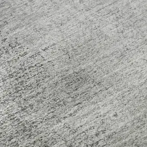 Photo of 8' Gray And Silver Ombre Washable Round Rug With UV Protection