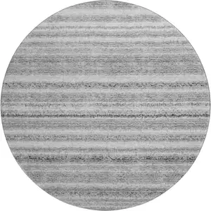 Photo of 8' Gray And Silver Striped Washable Round Rug With UV Protection