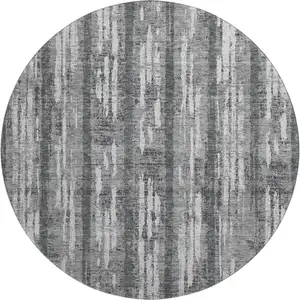 Photo of 8' Gray And Silver Striped Washable Round Rug With UV Protection