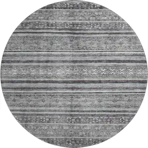 Photo of 8' Gray And Silver Striped Washable Round Rug With UV Protection