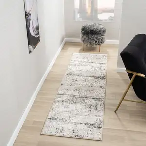 Photo of 7' Gray And Slate Gray Abstract Distressed Runner Rug