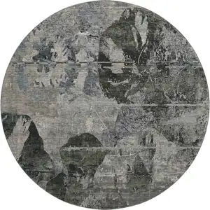 Photo of 8' Gray And Taupe Abstract Washable Round Rug With UV Protection