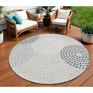 Photo of 8' Gray And Taupe Round Geometric Washable Indoor Outdoor Area Rug