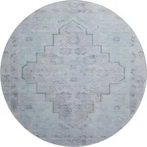 Photo of 8' Gray And Teal Medallion Washable Round Rug With UV Protection
