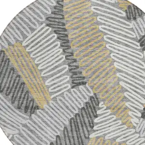 Photo of 8' Gray Beige And Ivory Round Floral Washable Indoor Outdoor Area Rug