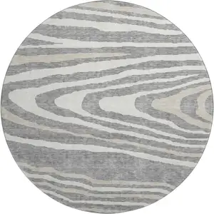 Photo of 8' Gray Beige And Ivory Woodland Lodge Washable Round Rug With UV Protection