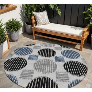 Photo of 8' Gray Black And Blue Round Geometric Washable Indoor Outdoor Area Rug
