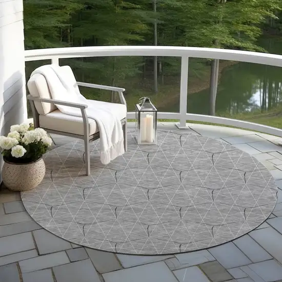 8' Gray Black And Ivory Round Geometric Washable Indoor Outdoor Area Rug Photo 6