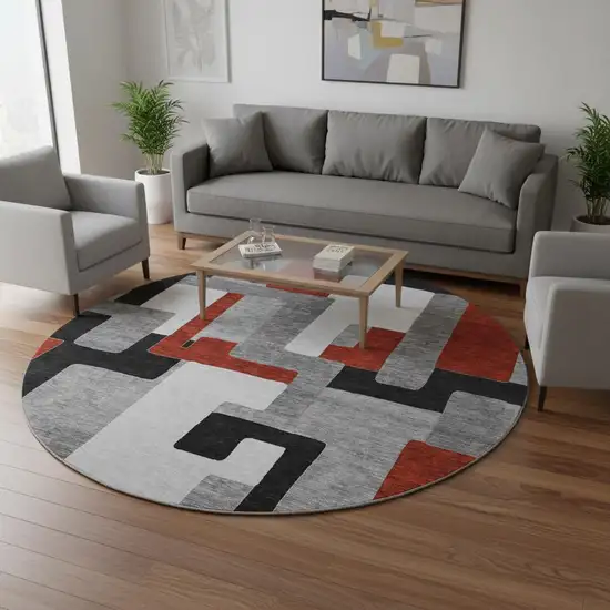 8' Gray Black And Red Geometric Washable Round Rug With UV Protection Photo 2