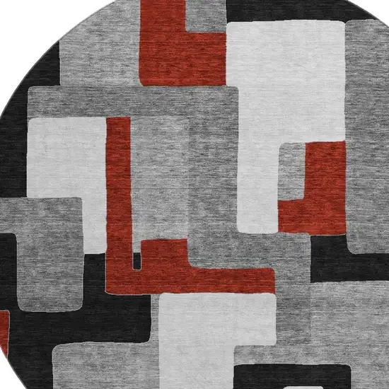 8' Gray Black And Red Geometric Washable Round Rug With UV Protection Photo 2