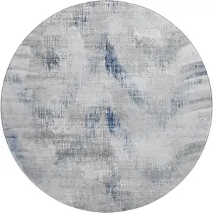 Photo of 8' Gray Blue And Ivory Abstract Washable Round Rug With UV Protection