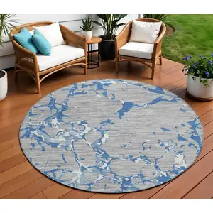 Photo of 8' Gray Blue And Ivory Round Striped Washable Indoor Outdoor Area Rug