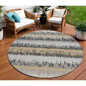 Photo of 8' Gray Brown And Beige Round Striped Washable Indoor Outdoor Area Rug
