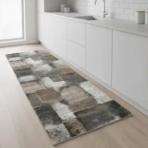 Photo of 8' Gray Brown And Ivory Abstract Runner Rug