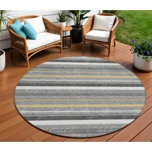 Photo of 8' Gray Brown And Ivory Round Striped Washable Indoor Outdoor Area Rug