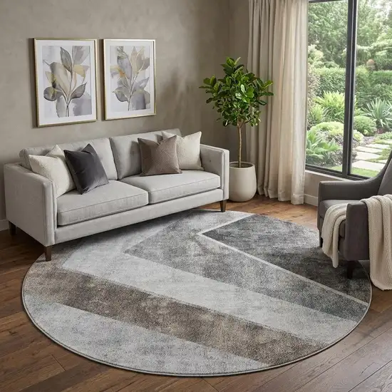 8' Gray Brown And Silver Geometric Washable Round Rug With UV Protection Photo 1